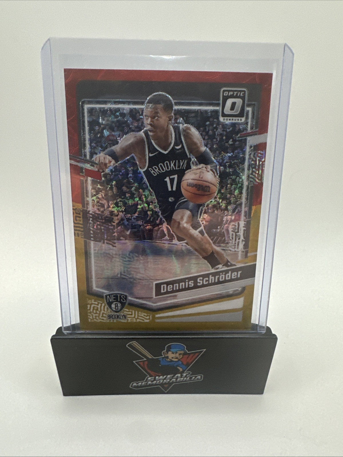 2023-24 Donruss Optic Red & Gold International /99 Dennis Schröder